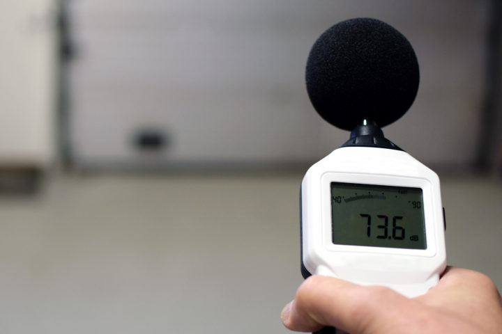 Sound meter being used to measure sound in a closed environment.